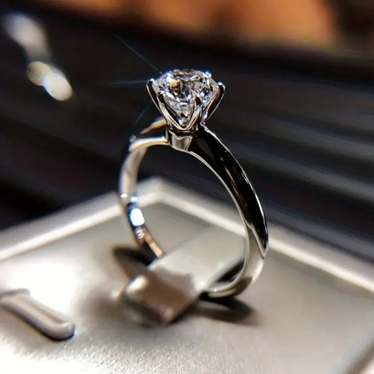 ANELLO SOLITARIO LUMIÈRE™ IN ZIRCONI E ACCIAIO PLACCATO ARGENTO